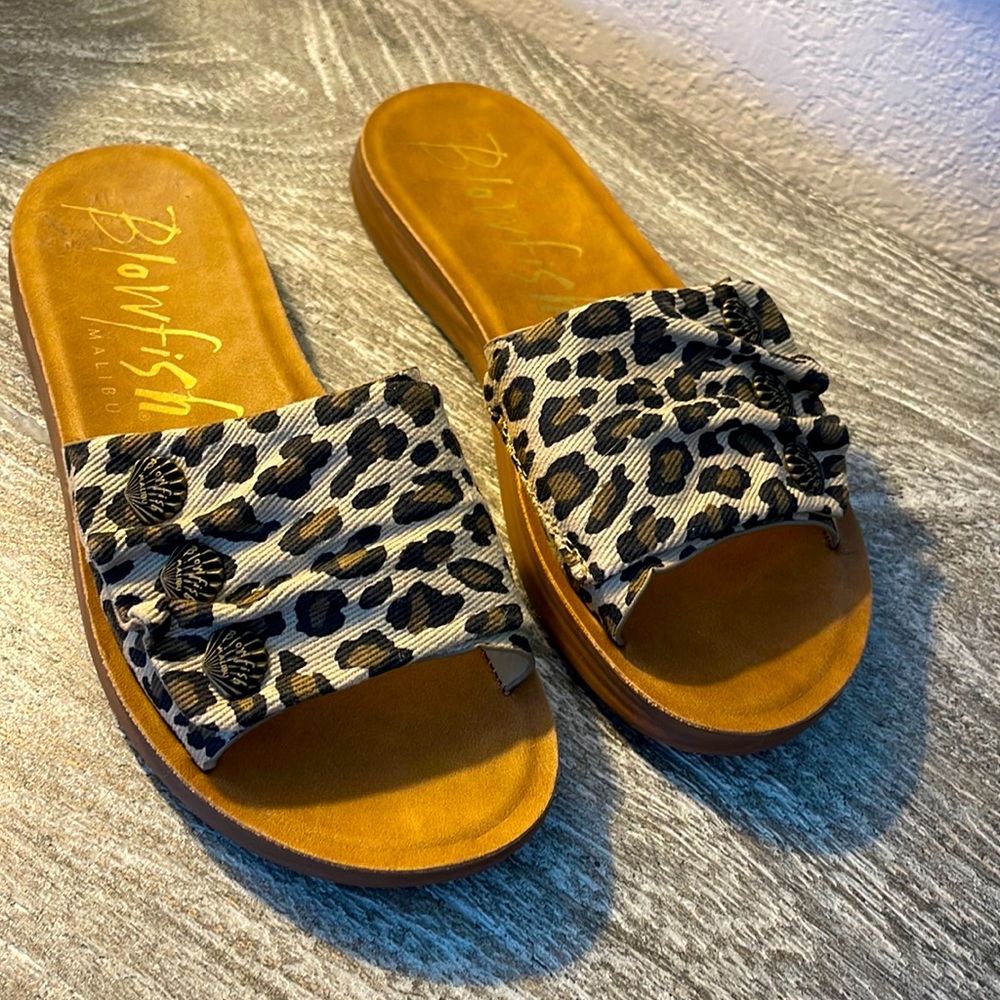 Slip on leopard design canvas sandals. Blowfish brand.  Never worn.  Size 7